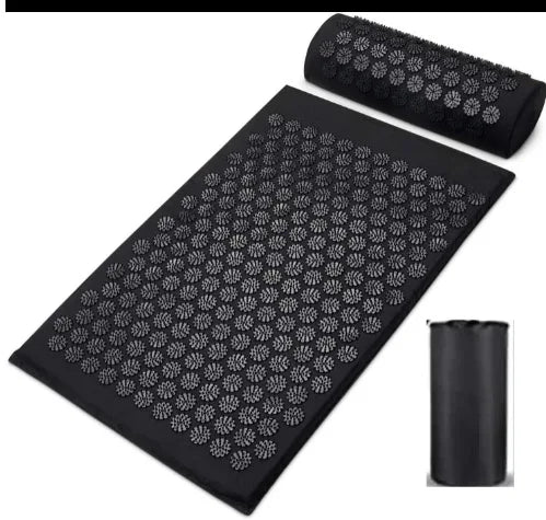 acupressure yoga mat in black with a matching cylinder for support, featuring pressure-point designs for enhanced relaxation.